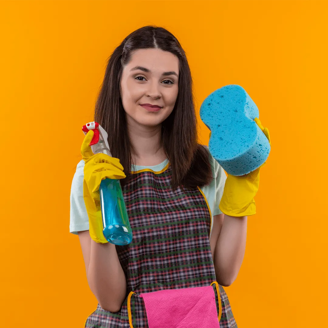 woman with colorful cleaning supplies